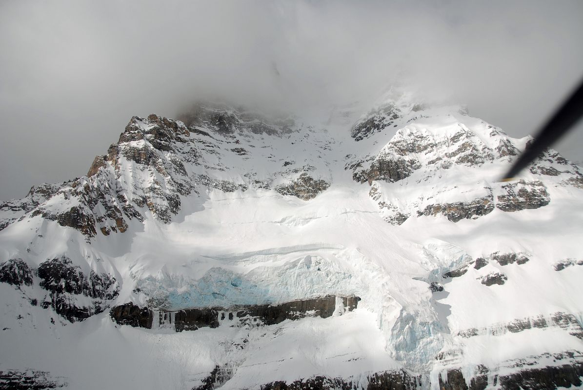 24 Mount Assiniboine With Summit In Clouds From Helicopter In Winter